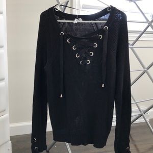 Black sweater with tie detail